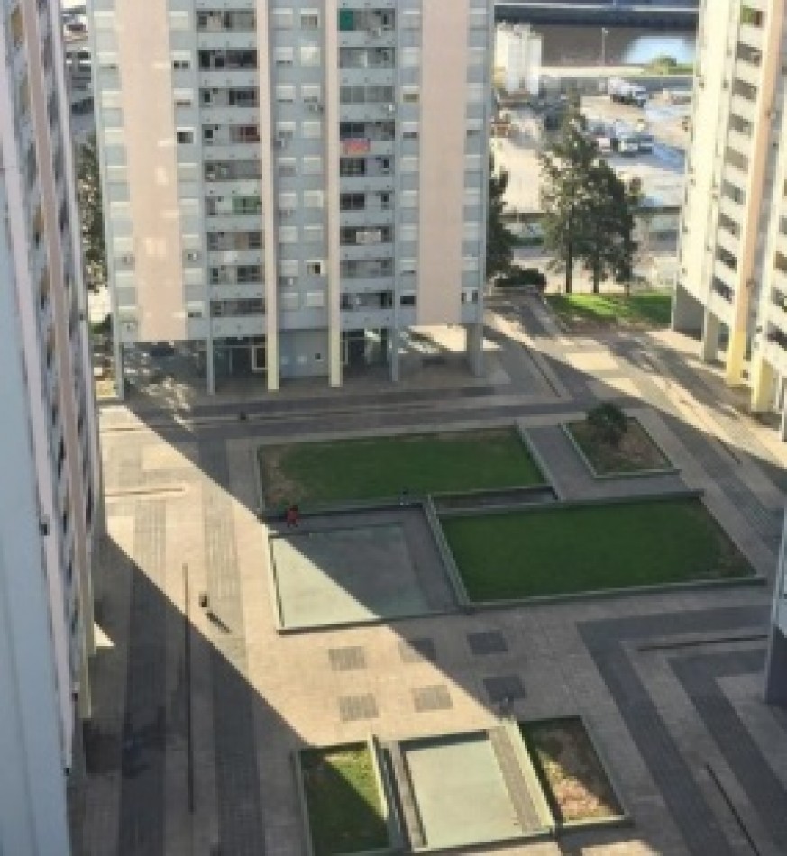 Departamento de 3 ambientes, piso 14, con cochera cubierta. Torres Pueyrredon.