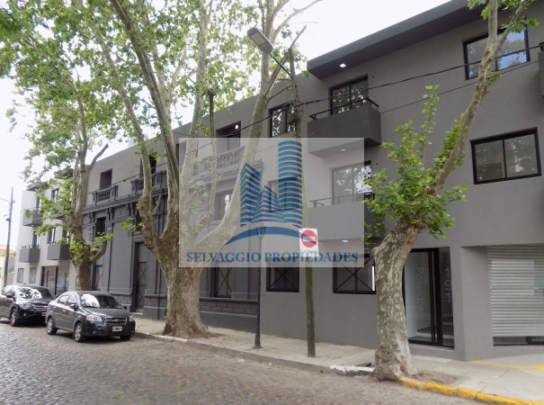 DEPARTAMENTO 2 AMBIENTES AL FRENTE CON PATIO. PLANTA BAJA, DTO A, 58M2. TEMPERLEY.