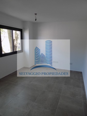 DEPARTAMENTO 2 AMBIENTES AL FRENTE CON PATIO. PLANTA BAJA, DTO A, 58M2. TEMPERLEY.