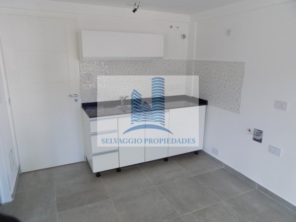 DEPARTAMENTO 2 AMBIENTES AL FRENTE CON PATIO. PLANTA BAJA, DTO A, 58M2. TEMPERLEY.